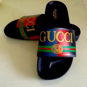 Gucci slides black with red,green,blue,and gold colors made in Italy